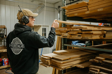 Woodworker selects oak boards