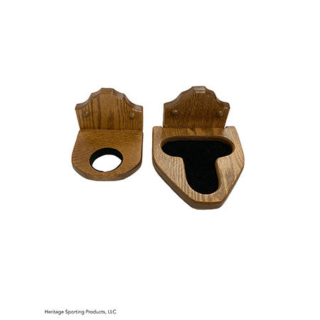 Two piece wood gun rack side by side showing the top barrel rest hole and the bottom clover design. Made from American Oak and stained with Minwax special walnut stain.