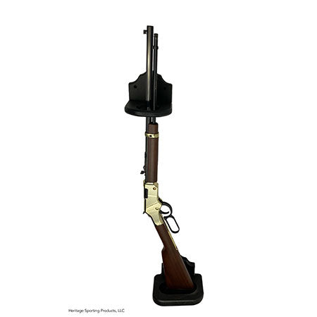 Vertical, wall mounted gun rack for home defense or display. Comes in two pieces- a top piece encircles the barrel and the bottom piece cradles the bottom of the gun. A rifle is displayed vertically on the wall.