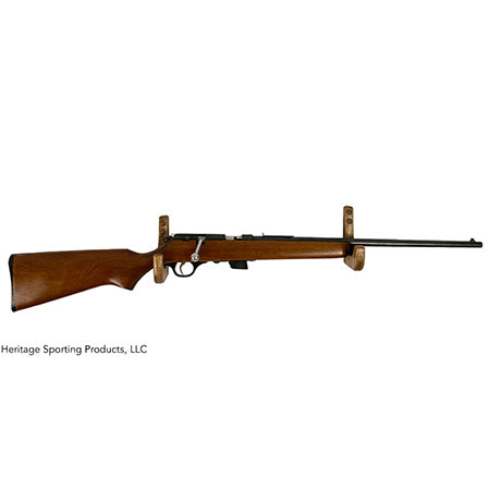 Horizontal wood gun display shows two hook shaped mounts cradling a rifle.